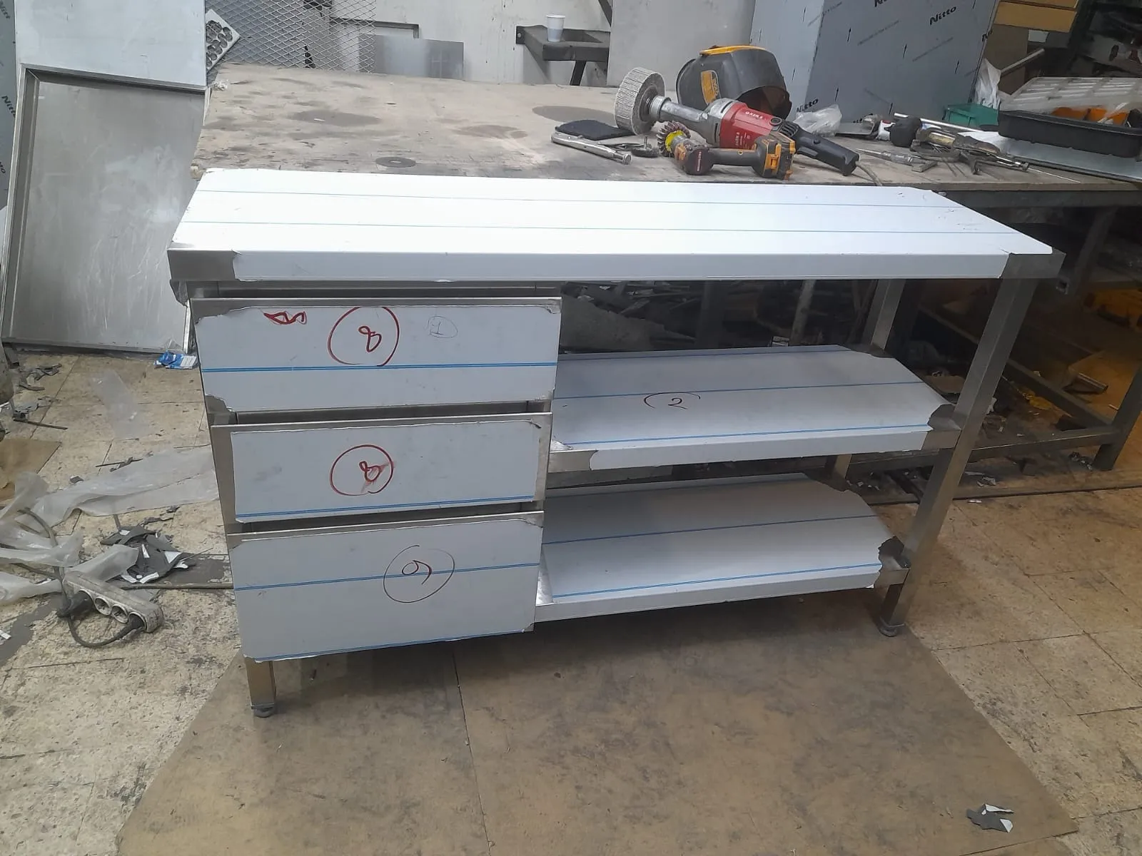Service counter with storage drawers.